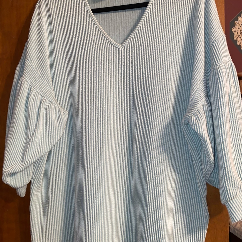 mint green, choker neck, 3/4 length sleeve light sweater material shirt